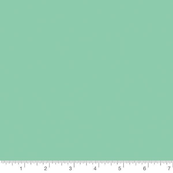 Colorworks Solid Seafoam by Northcott, solid quilting cotton with a ruler for scale