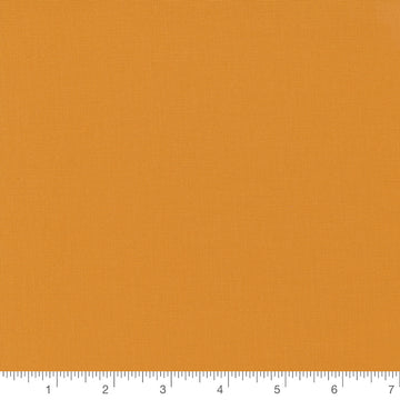 Bella Solid in Cheddar Orange by Moda, solid cheddar orange quilting cotton fabric swatch with inch ruler for scale