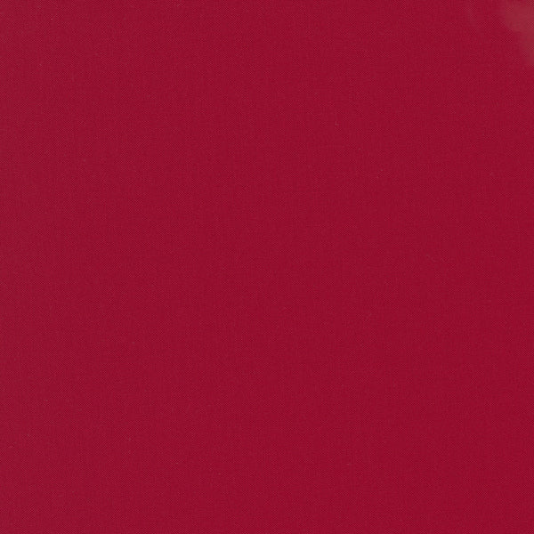 Christmas Red Bella Solid by Moda Fabrics, solid red quilting cotton fabric swatch