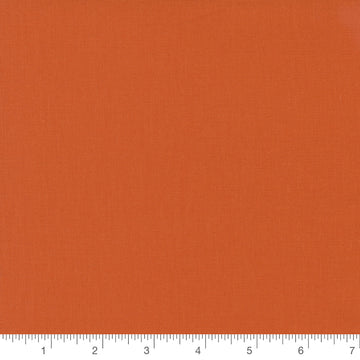 Clementine Orange Bella Solid by Moda Fabrics, solid orange quilting cotton fabric swatch with inch ruler for scale