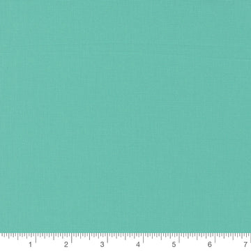Peacock Turquoise Bella Solid by Moda Fabrics, solid turquoise quilting cotton fabric swatch with inch ruler for scale