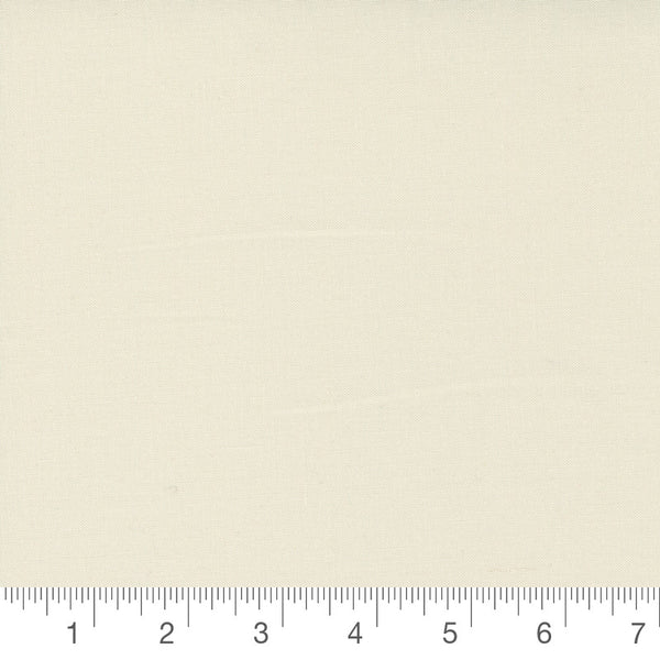 Eggshell Bella Solid by Moda 9900-281, solid off-white swatch with inch ruler