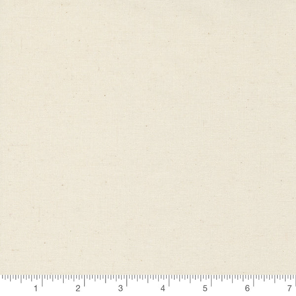Bella Muslin in Unbleached by Moda, natural unbleached muslin solid quilting cotton with a ruler for scale