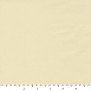 Fig Tree Cream Bella Solid by Moda Fabrics, solid cream quilting cotton fabric swatch with inch ruler for scale