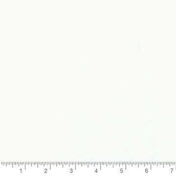 White Bleached Bella Solid by Moda, solid quilting cotton with a ruler for scale