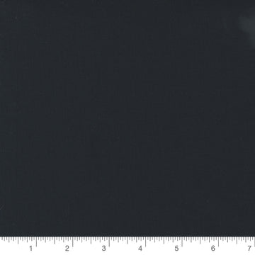 Bella Solid Black by Moda Fabrics, solid black quilting cotton fabric swatch with inch ruler for scale