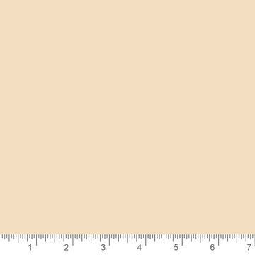 Pure Solids in Creme de la Creme by Art Gallery Fabrics, solid quilting cotton with a ruler for scale