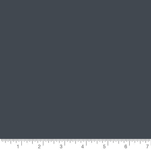 Pure Solids in Slate by Art Gallery Fabrics, solid quilting cotton with a ruler for scale