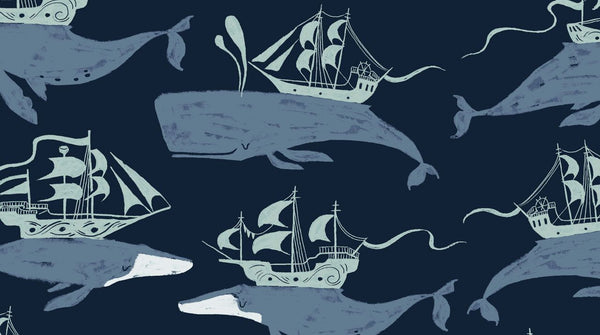 Aweigh North Whale Ships in Navy by Rae Ritchie for Dear Stella, pale blue whales and tall sailing ships on a dark navy ground