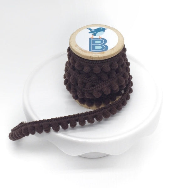 Pom Pom Baby in Brown